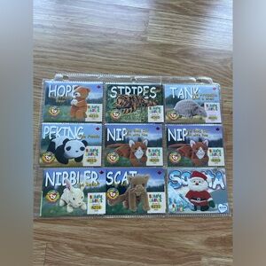 61 beanie babie cards (selling all together)